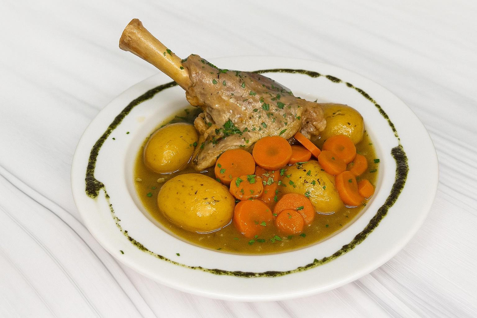 Kleftiko from Ioannina served at Jars Meze in Bath, lamb on the bone with roasted vegetables.
