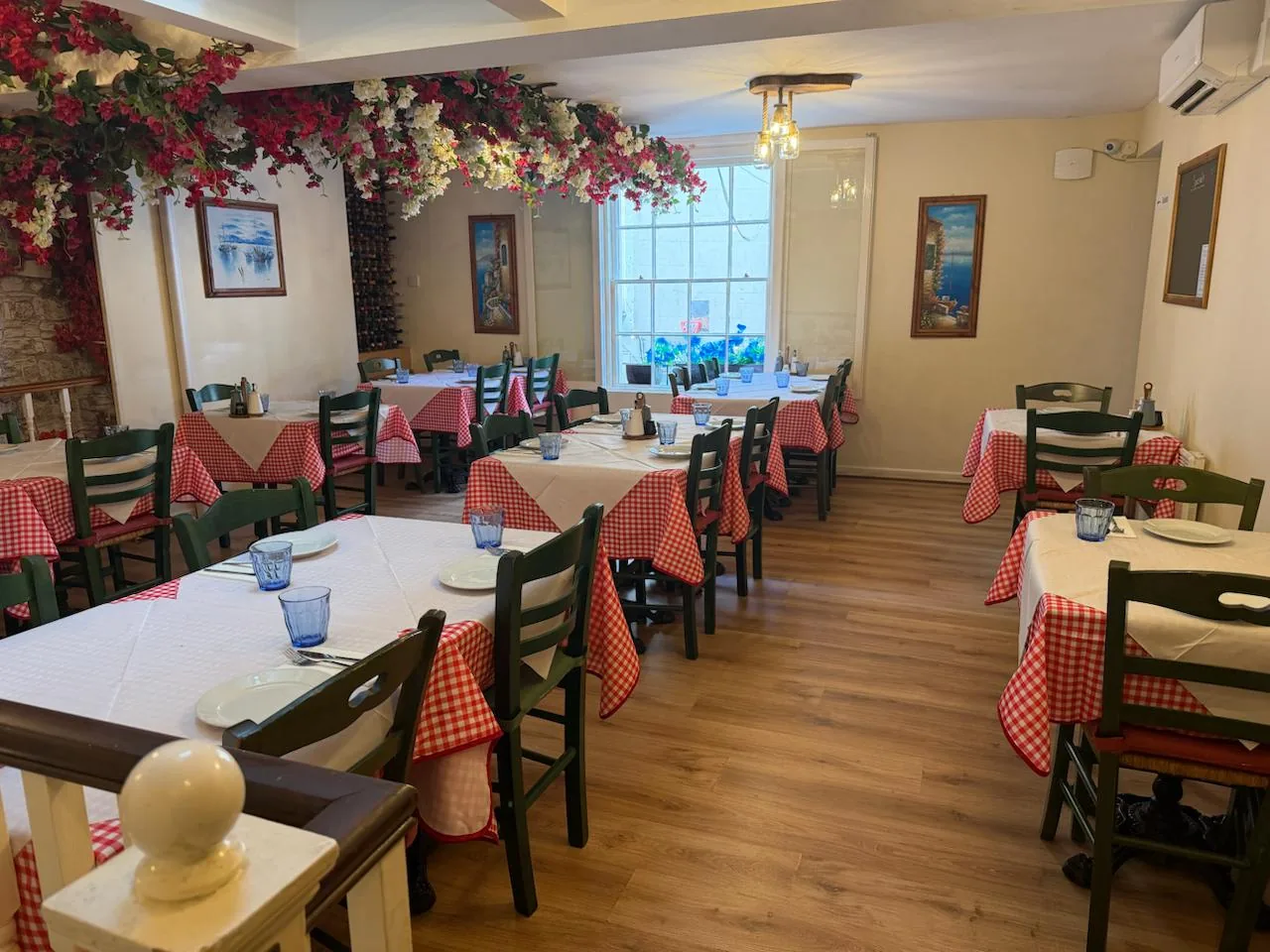 The Jars Meze dining room with red gingham tablecloths
